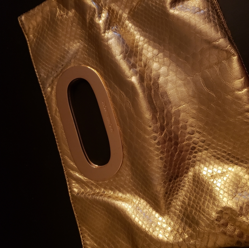 MK gold clutch NWOT